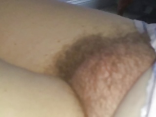 exposing the wifes big round hairy mound